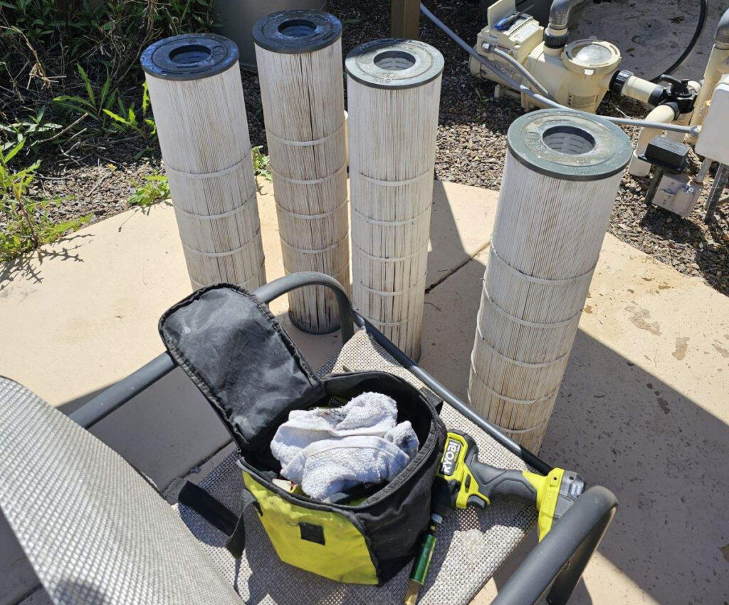 Tools and supplies used for regular pool maintenance.